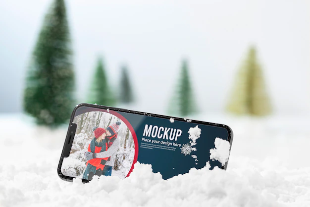 Free PSD | Close up smartphone in snow