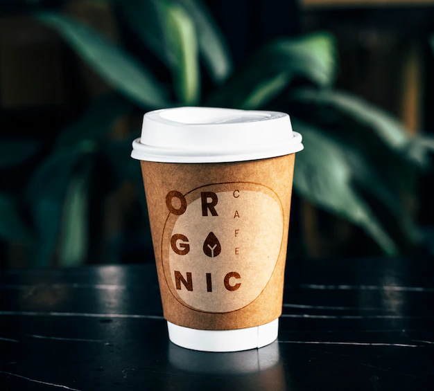 Free PSD | Disposable coffee paper cup mockup design