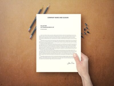 Free PSD | Hand holding document mock up