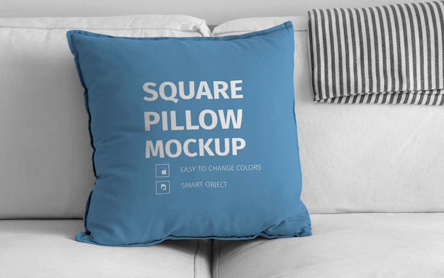 Free PSD | Mockup of square pillow over white sofa