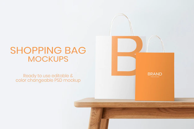 Free PSD | Paper bags mockup psd for shopping and branding on a wooden table