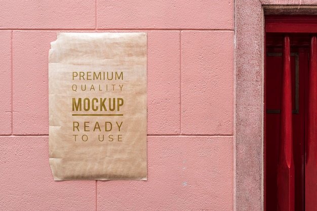 Free PSD | Poster mockup on red wall