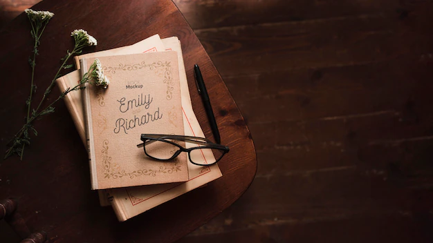 Free PSD | Top view of books with glasses and pen