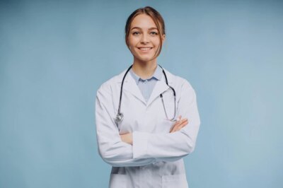 Free Photo | Woman doctor wearing lab coat with stethoscope isolated