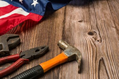 Free Photo | American flag and tools near the helmet labor day concept.