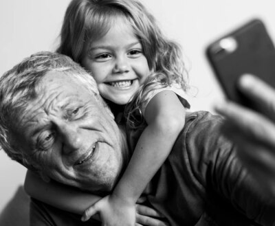 Free Photo | Grandfather taking a selfie with his granddaughter