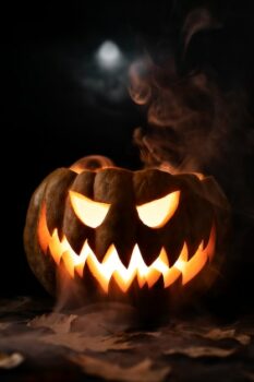 Free Photo | Spooky halloween pumpkin glowing face