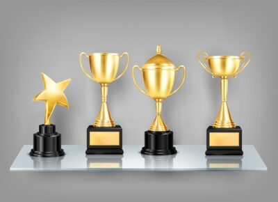 Free Vector | Trophy awards realistic images on shelf composition of golden cups with black pedestals on glass shelf