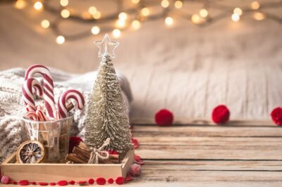 Free Photo | Christmas festive decor still life on wooden background, concept of home comfort and holiday