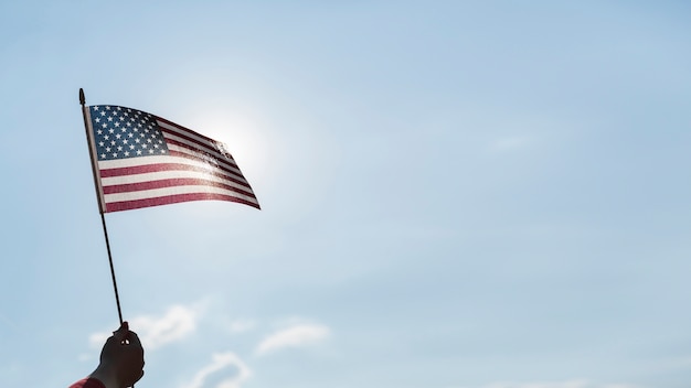 Free Photo | Hand waving usa flag