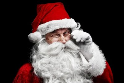 Free Photo | Man in santa claus costume winking