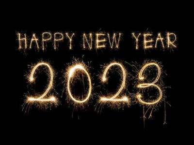 Free Photo | Happy new year 2023. sparkling burning text happy new year 2023 isolated on black background. beauti