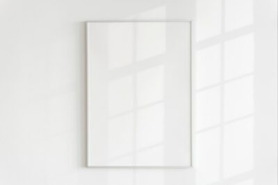 Free Photo | Blank frame on a wall with natural light