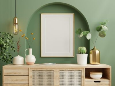 Free Photo | Mockup photo frame green wall mounted on the wooden cabinet