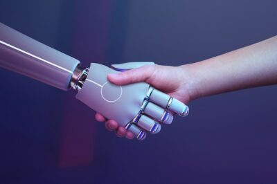 Free Photo | Robot handshake human background, futuristic digital age