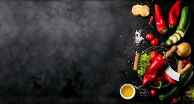 Free Photo | Vegetables set to the left of a black slate