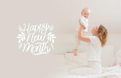 Free Photo | Mother and child with happy new month lettering