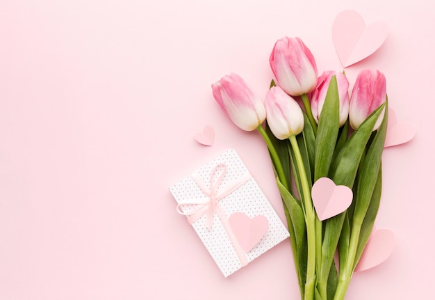 Free Photo | Tulips bouquet and gift