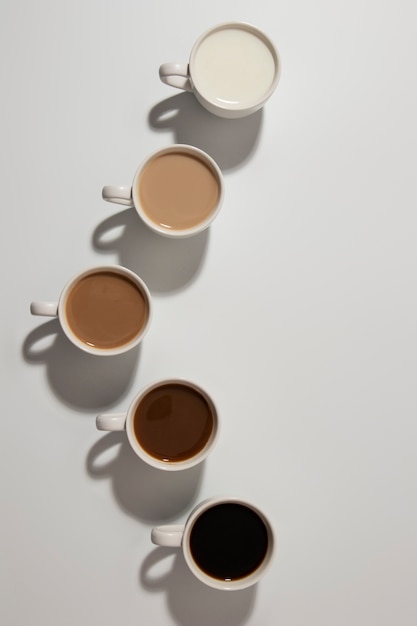 Free Photo | Above view different coffee cups arrangement