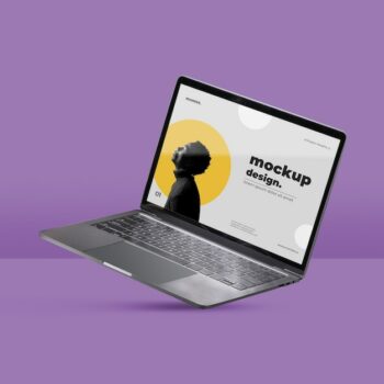 Free Photo | Laptop balancing with purple background
